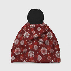 Шапка c помпоном Snowflakes on a red background